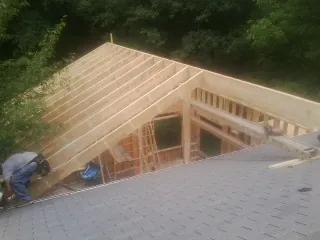 Framing a new roof addition that ties into an existing shingle roof in Goochland